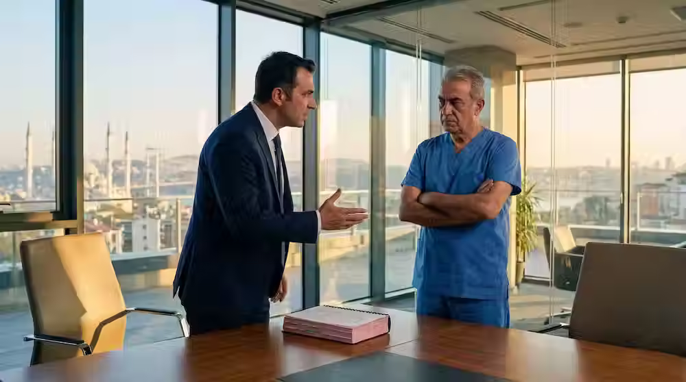 Turkish medical malpractice lawyer questioning a doctor during a private hospital negligence lawsuit negotiation in Istanbul.